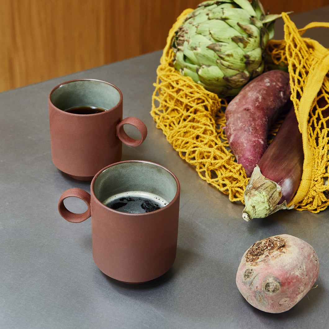 Terracotta colored mugs