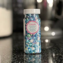 Load image into Gallery viewer, blue white and green gluten free sprinkle medley for cakes in a bottle
